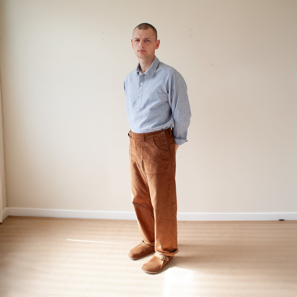 Side button trousers in medium cord