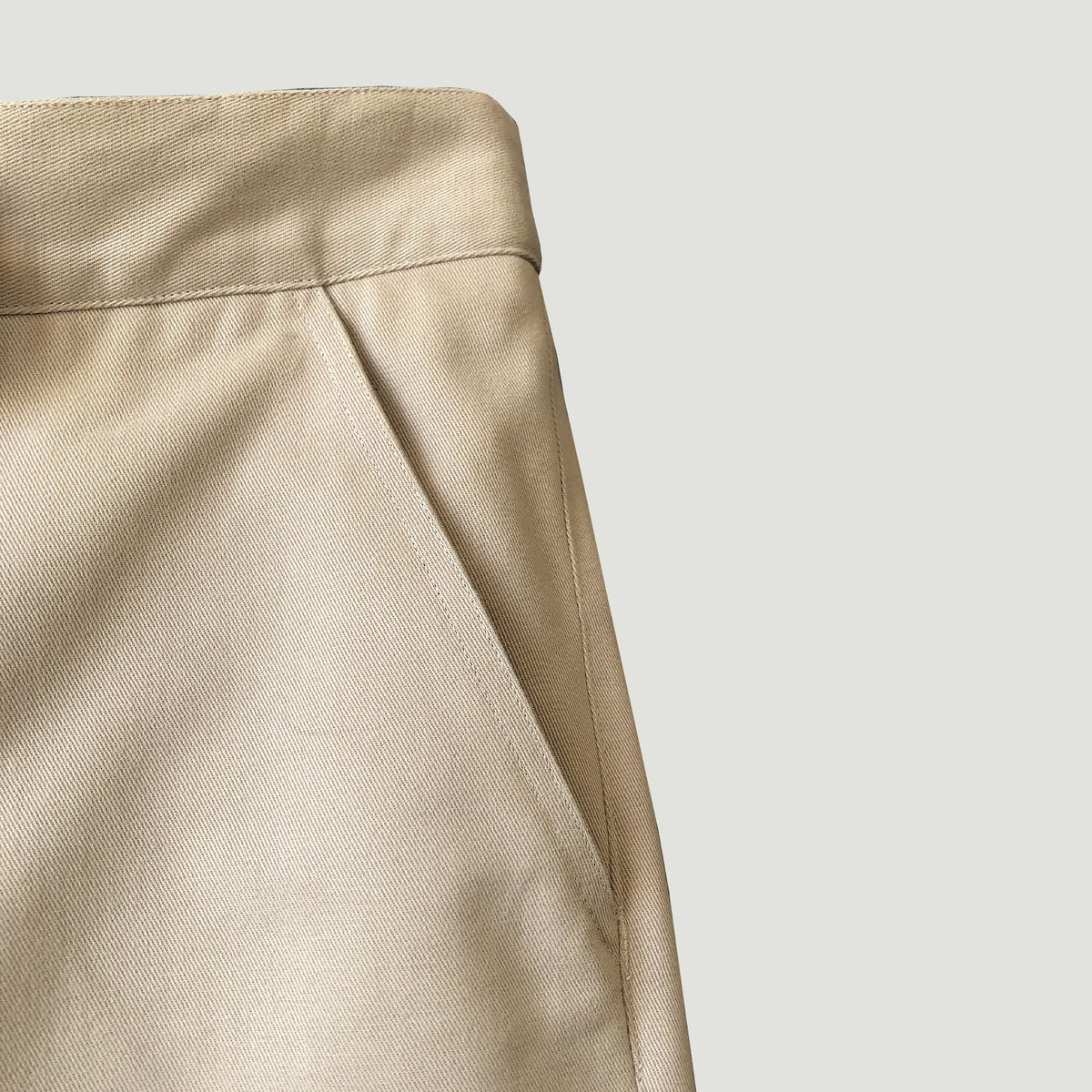 Straight legged trousers in cream cotton twill