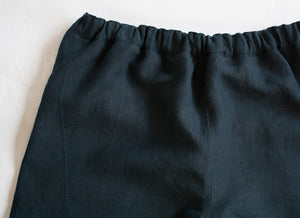 waist detail of some navy linen elasticated trousers