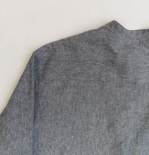 collar detail of a blue cotton and hemp grandad shirt