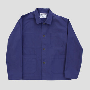 front view of a mens indigo traditional chore jacket with three outer pockets made sustainably in the UK