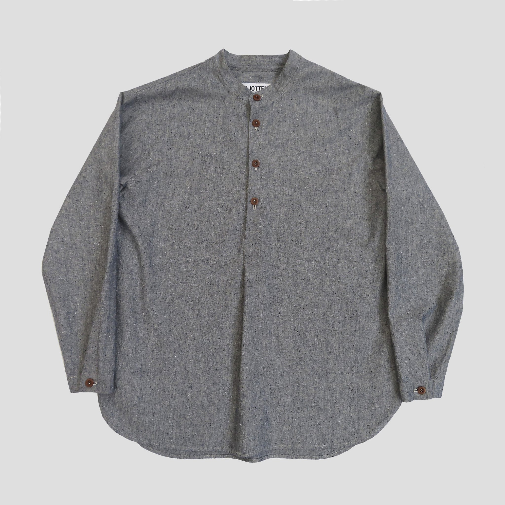 front view of a mens granddad shirt made in a blue organic hemp cloth with brown buttons