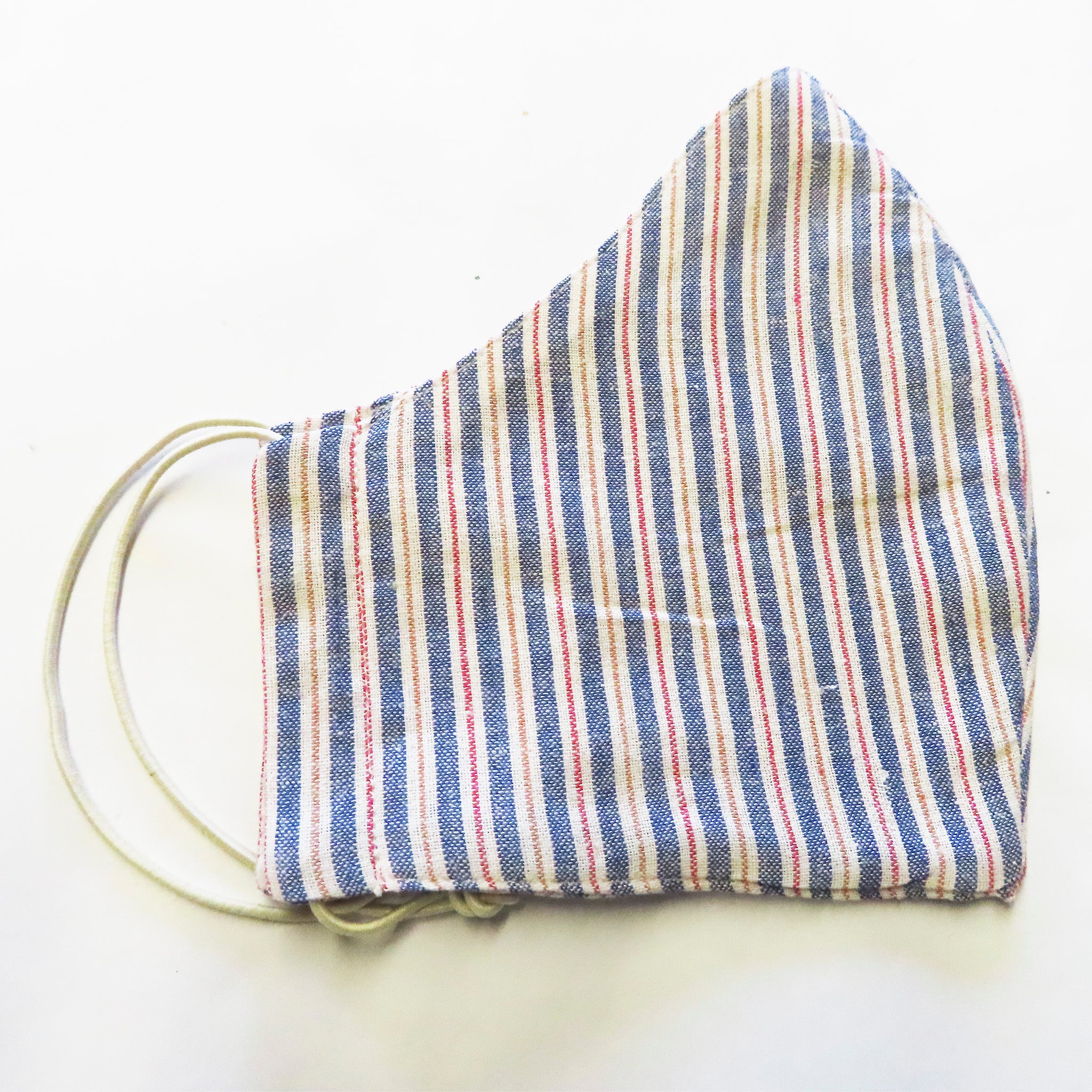 side view of a striped cotton face mask